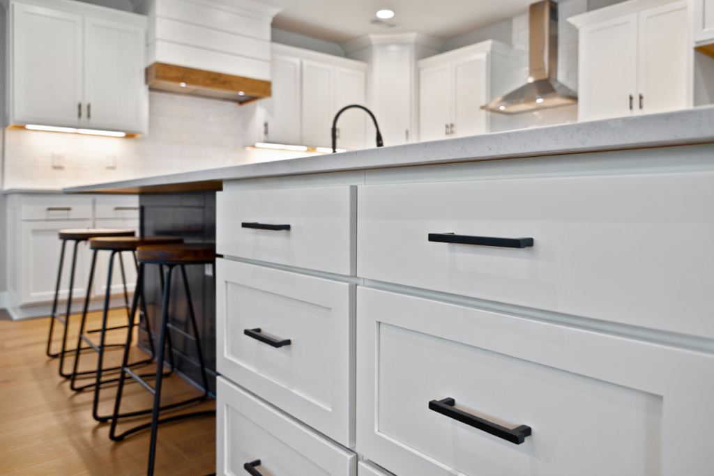 Modern kitchen cabinet painting with island white finish black pulls