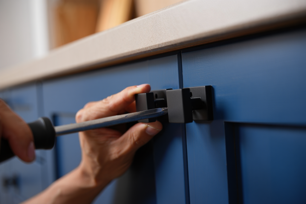  New hardware installed on refinished kitchen cabinet door as part of affordable Utah kitchen refresh