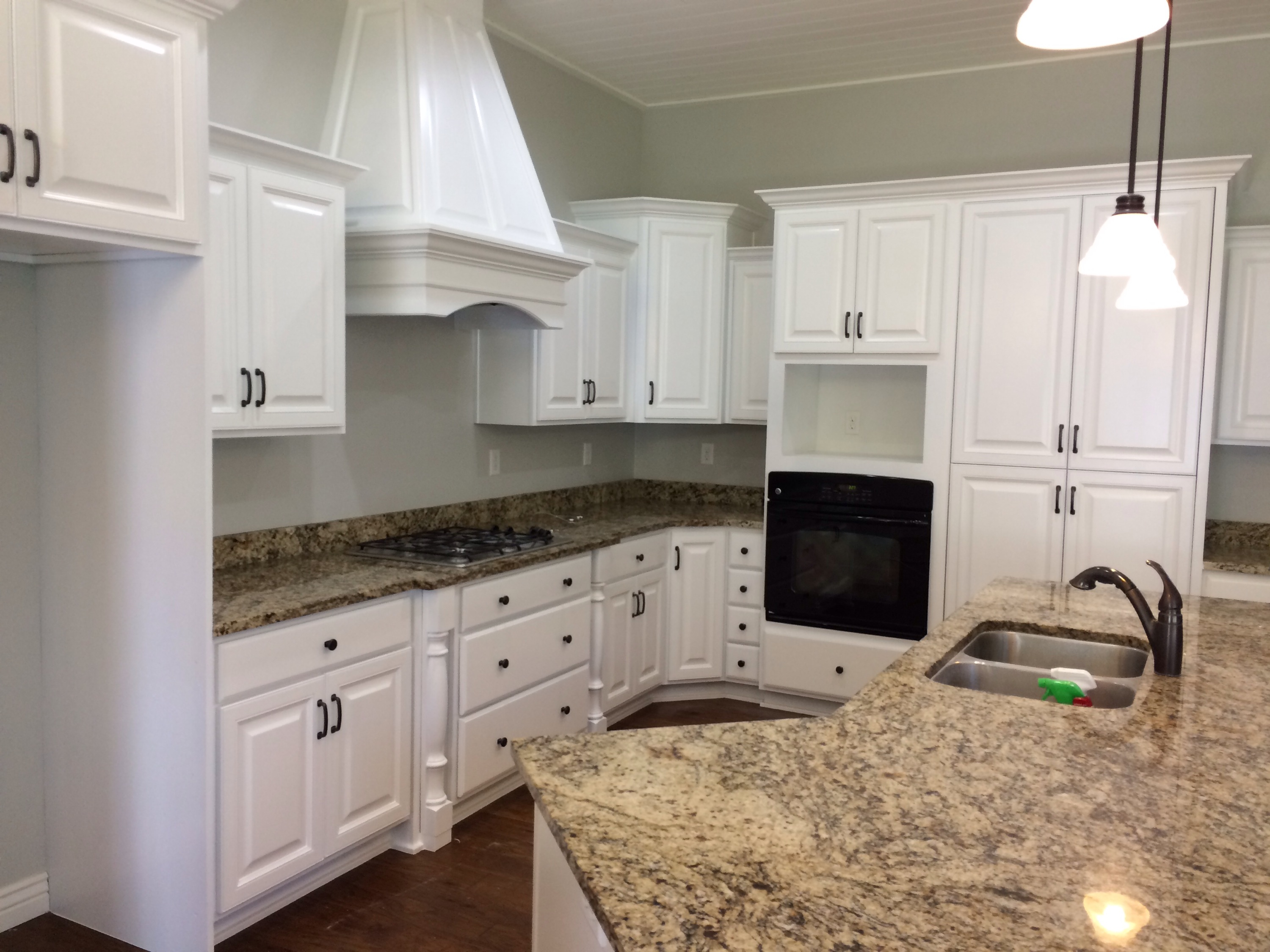 Knotty Alder Kitchen Cabinets And Range After Being Refinished
