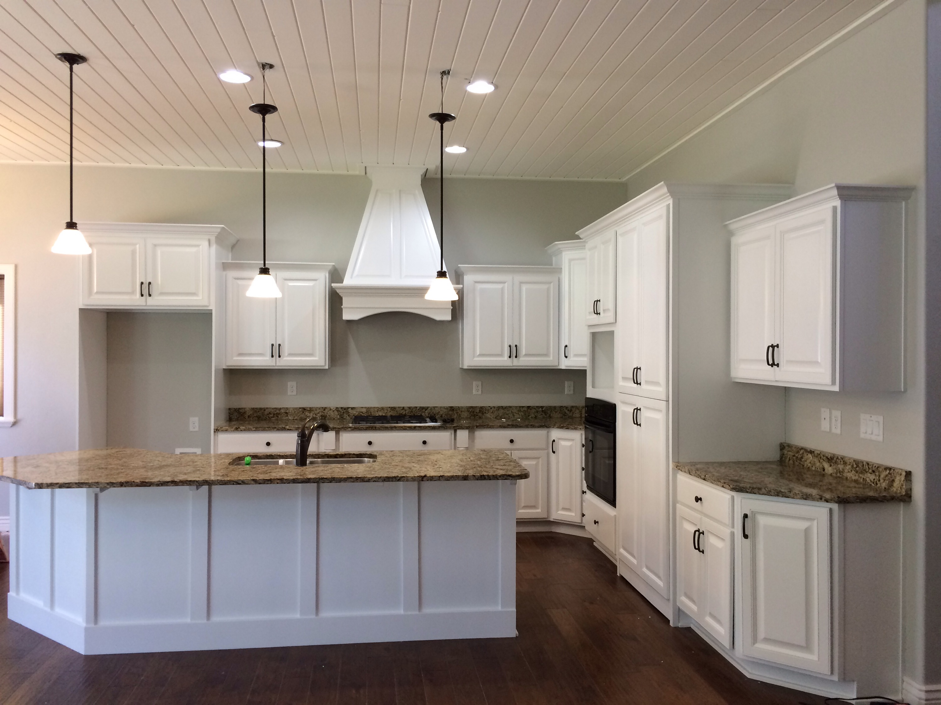 Knotty Alder Kitchen Cabinets After Being Refinished In White